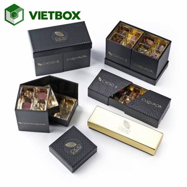 in-hop-chocolate-theo-yeu-cau-tao-dau-an-rieng-cho-thuong-hieu (2) Giá in hộp chocolate phụ thuộc vào kích thước, chất liệu, số lượng, kiểu hộp, khay định hình và yêu cầu gia công