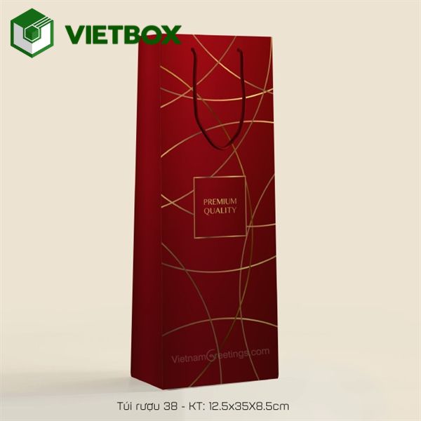in-tui-giay-dung-ruou-co-quai-chac-chan-thiet-ke-sang-trong (1) Túi giấy đựng rượu giúp bảo vệ sản phẩm, thuận tiện khi cầm xách và tạo hình ảnh chuyên nghiệp khi trao tặng