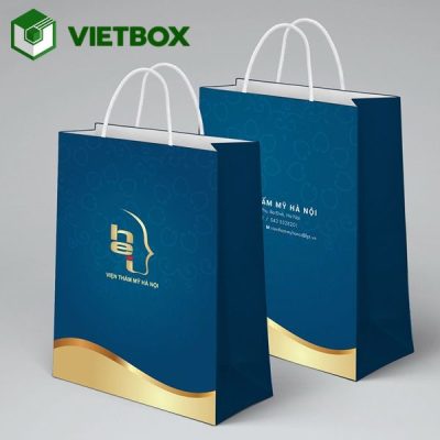 Quy trình in túi giấy từ tiếp nhận yêu cầu, thiết kế, duyệt mẫu đến in, gia công, kiểm tra và đóng gói